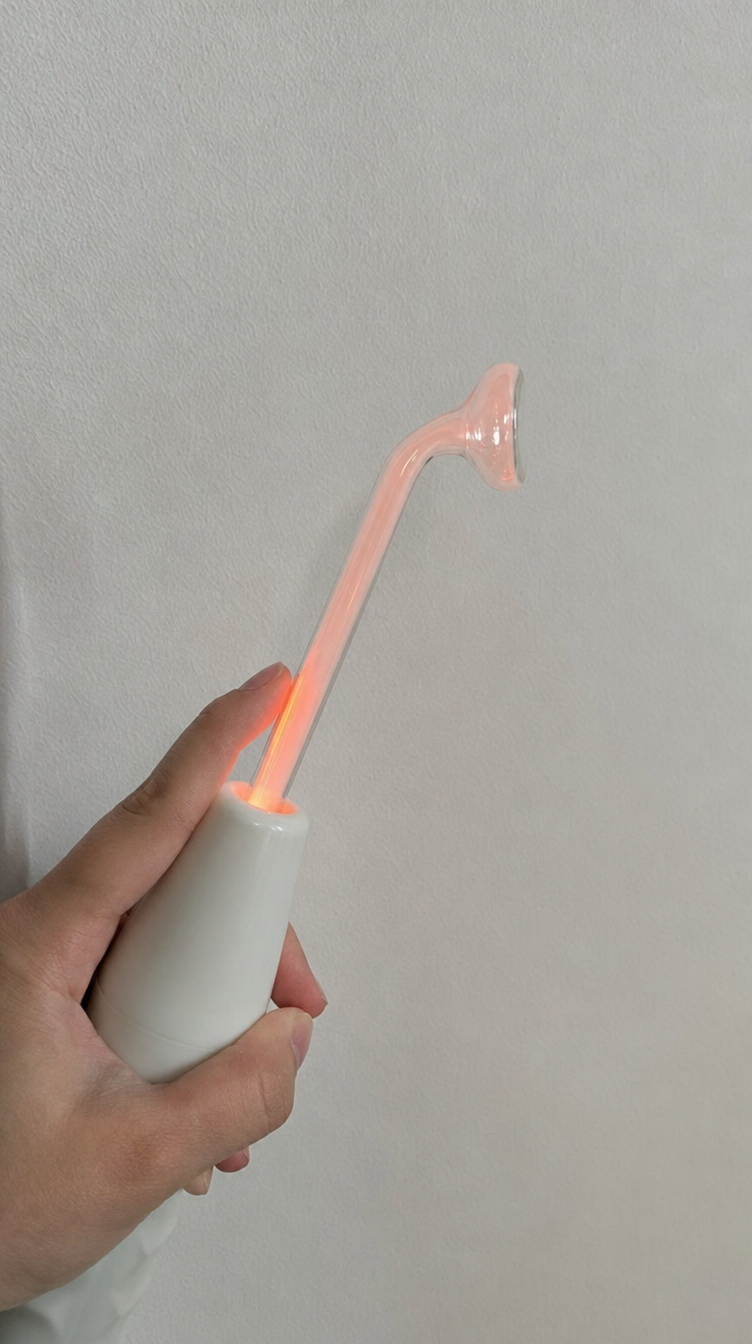 A facial tool photographed by Glow by Jjo